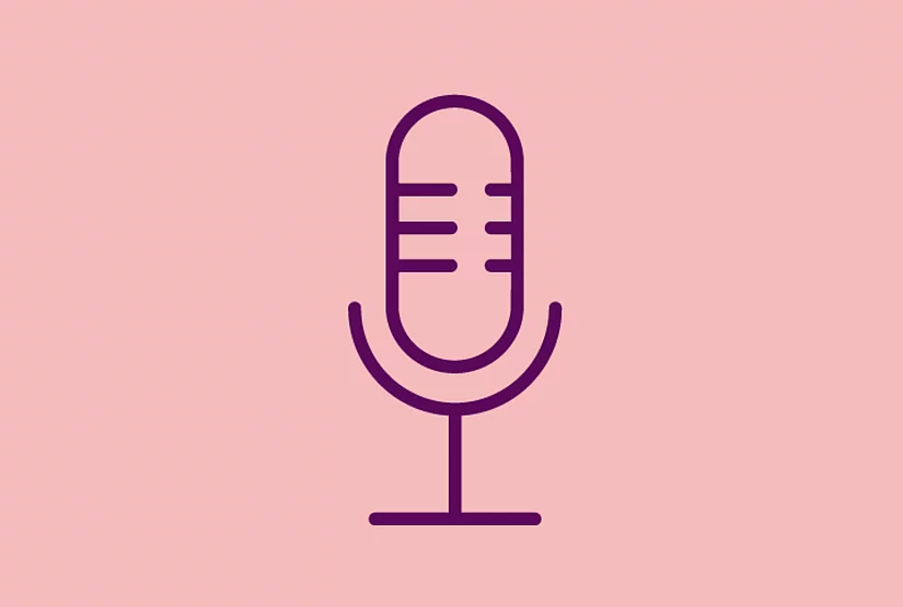 An image shows a graphic icon of a microphone, on light red background