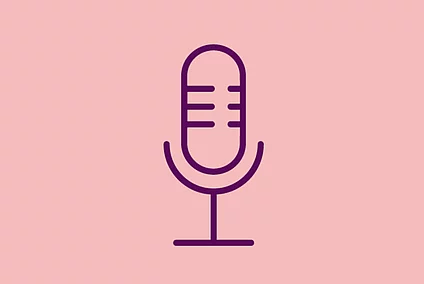 An image shows a graphic icon of a microphone, on light red background
