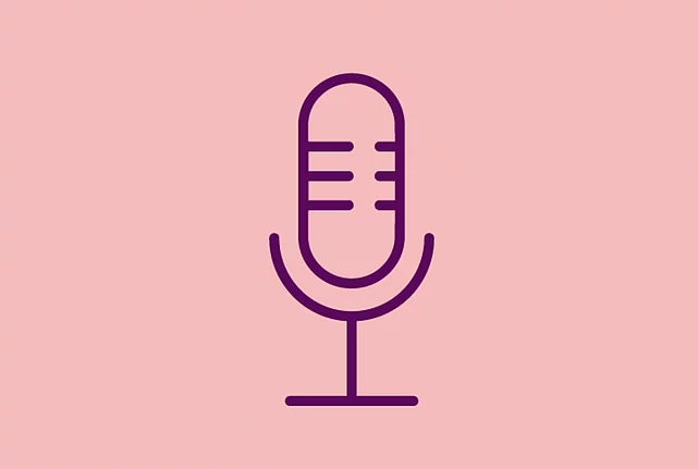 An image shows a graphic icon of a microphone, on light red background