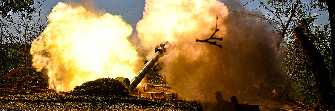 Soldiers from the artillery crew of the Striletskyi Special Forces Police Battalion of the Main Department of the National Police in the Zaporizhzhia region fire a 122-mm howitzer D-30 at the positions of Russian troops in the Zaporizhzhia region, Ukraine, on May 23, 2025. 