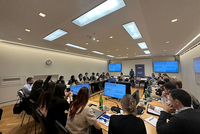An image shows the participants of the OSCE young experts training during a session.