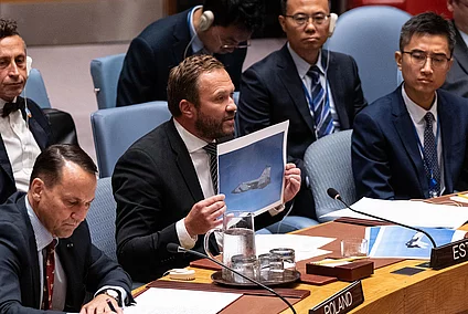 September 22, 2025, New York, USA: Margus Tsahkna, Minister for Foreign Affairs of Estonia showing photos of Russian jets while speaking during Security Council meeting at UN Headquarters in New York, NY on September 22, 2025 requested by Estonia after Russian military jets carrying missiles violated their airspace. 