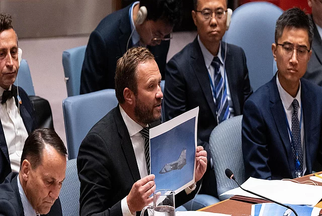 September 22, 2025, New York, USA: Margus Tsahkna, Minister for Foreign Affairs of Estonia showing photos of Russian jets while speaking during Security Council meeting at UN Headquarters in New York, NY on September 22, 2025 requested by Estonia after Russian military jets carrying missiles violated their airspace. 