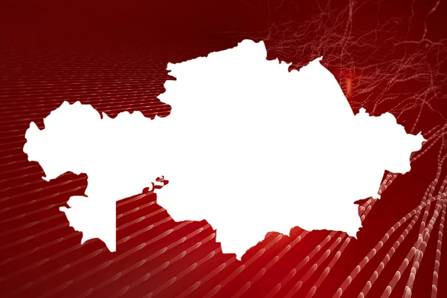 An image shows the outline of the map of Kazakhstan in front of abstract red background