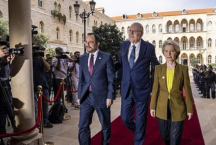 Lebanese caretaker Prime Minister Najib Mikati, center, welcomes Cyprus' President Nikos Christodoulides, left, and President of the European Commission Ursula von der Leyen at the government palace in Beirut, Lebanon, Thursday, May 2, 2024.