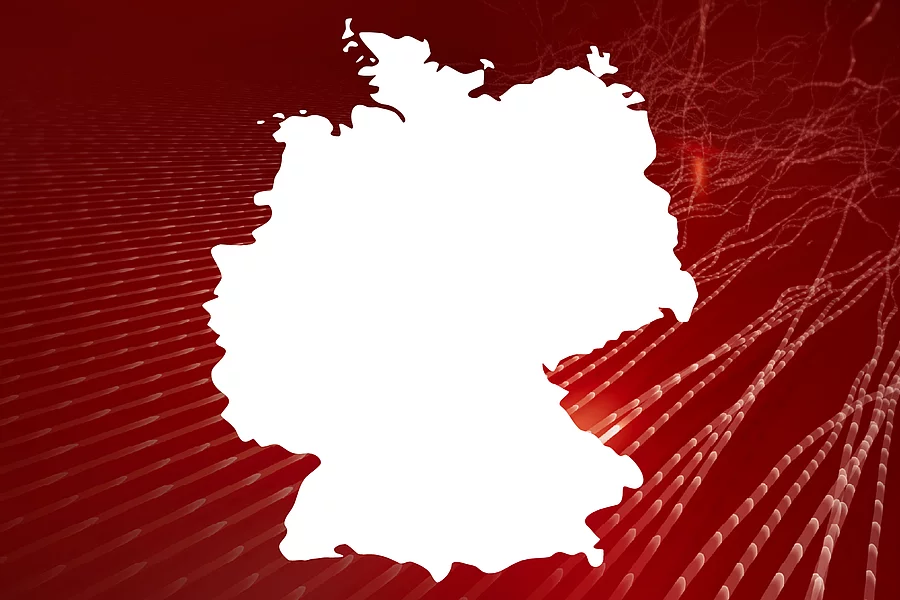 An image shows the outline of the map of Germany in front of abstract red background